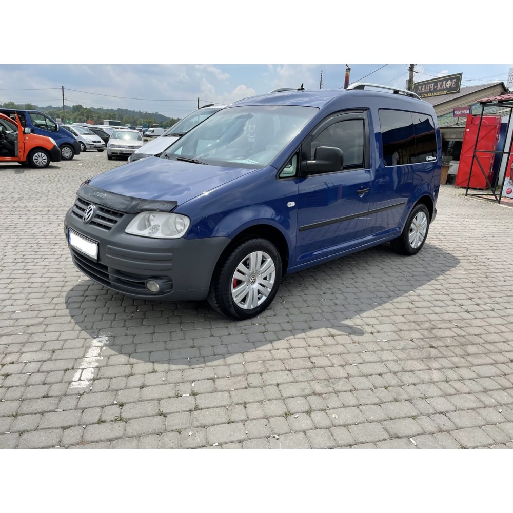 Дефлекторы окон (ветровики) Volkswagen Caddy 3,4 2004-2020 (на скотче) HIC