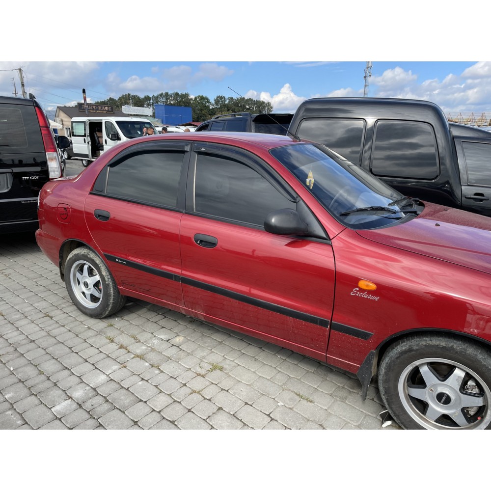 Дефлектори вікон (вітровики) Daewoo Lanos/Sens/Chevrolet Lanos 1997+ (на скотче) HIC